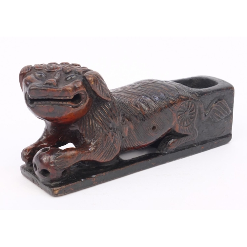 659 - Oriental Chinese wooden scribe's arm rest modelled as a dog of Foo, 20cm diameter