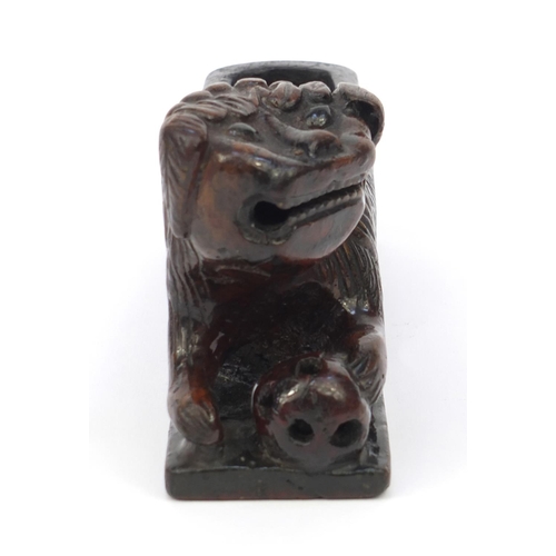 659 - Oriental Chinese wooden scribe's arm rest modelled as a dog of Foo, 20cm diameter