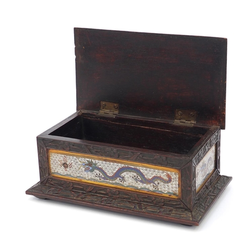 656 - Oriental Chinese hardwood box inlaid with cloisonné panels of dragons, 22cm wide