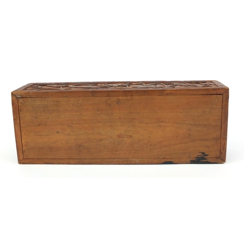 657 - Oriental Chinese hardwood box carved with dragons and flowers, 30cm wide