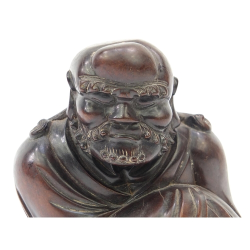 655 - Oriental Chinese carved wooden figure of an elder, 18cm high