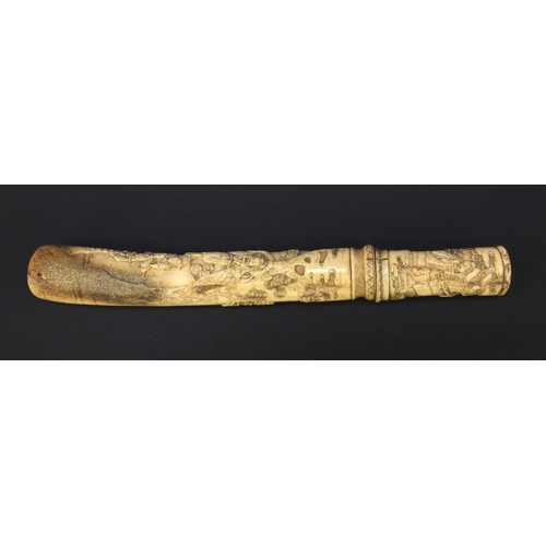 623 - Oriental carved bone dagger profusely carved with robed figures climbing a tree, 27.5cm long