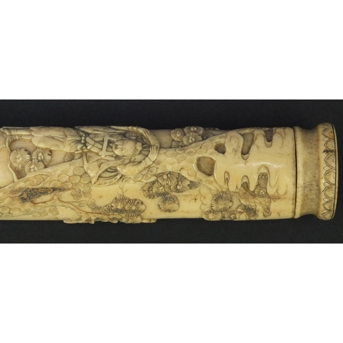 623 - Oriental carved bone dagger profusely carved with robed figures climbing a tree, 27.5cm long