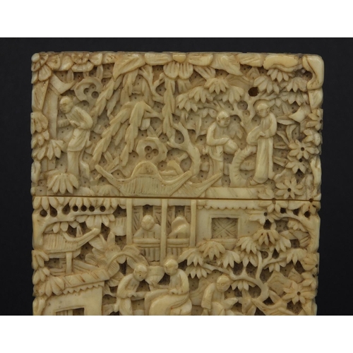 617 - Oriental Chinese Canton ivory card case profusely carved with seated figures, trees and bridges, 9.5... 