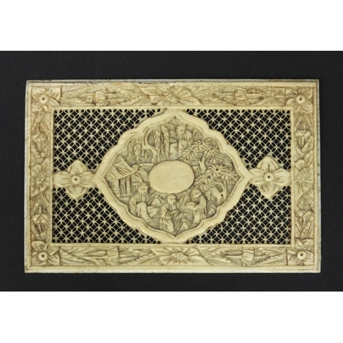 620 - Oriental ivory panel with pierced decoration, the border and central field carved with flowers and f... 