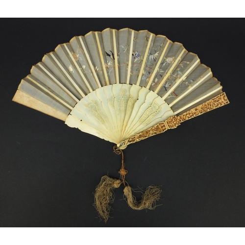 616 - Oriental Chinese Canton ivory fan carved with figures and flowers, the silk embroidered with birds a... 