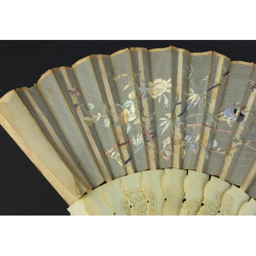 616 - Oriental Chinese Canton ivory fan carved with figures and flowers, the silk embroidered with birds a... 