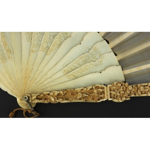 616 - Oriental Chinese Canton ivory fan carved with figures and flowers, the silk embroidered with birds a... 