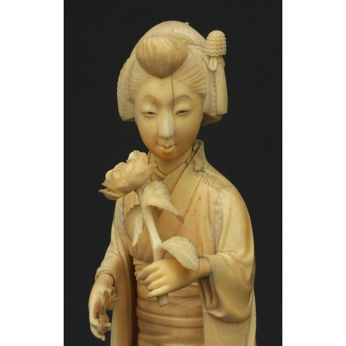 600 - Oriental Japanese carved ivory okimono of a geisha girl, red character mark to base, 30cm high