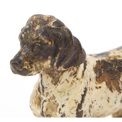 12 - Cold painted bronze model of a dog, 7cm high