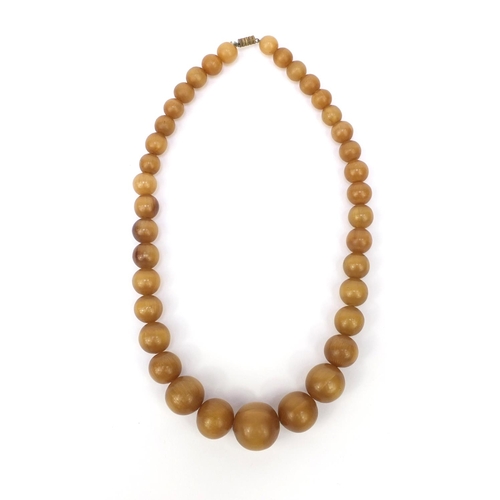 630 - Oriental Chinese rhino horn beaded necklace, the largest bead 2.5cm diameter