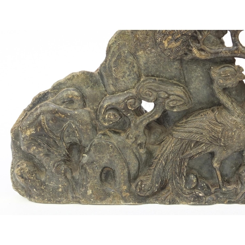 643 - Large oriental carved soapstone group of dragons and birds amongst trees, 39cm wide