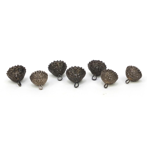 96 - Seven pierced silver filigree buttons, each 3cm diameter