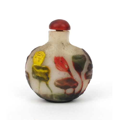 644 - Oriental Chinese four coloured cameo glass snuff bottle decorated with a continuous band of lotus fl... 