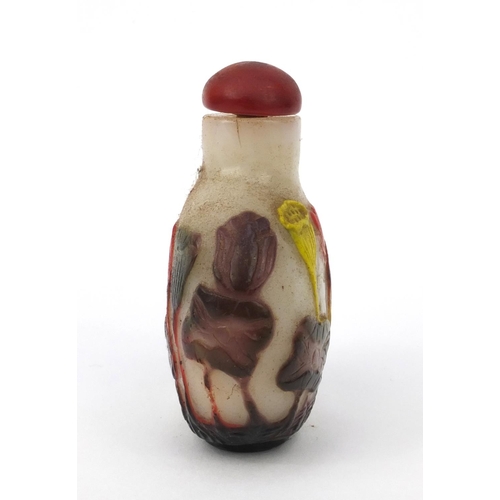 644 - Oriental Chinese four coloured cameo glass snuff bottle decorated with a continuous band of lotus fl... 