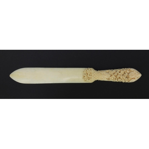 139 - Floral carved ivory letter opener, 24cm wide