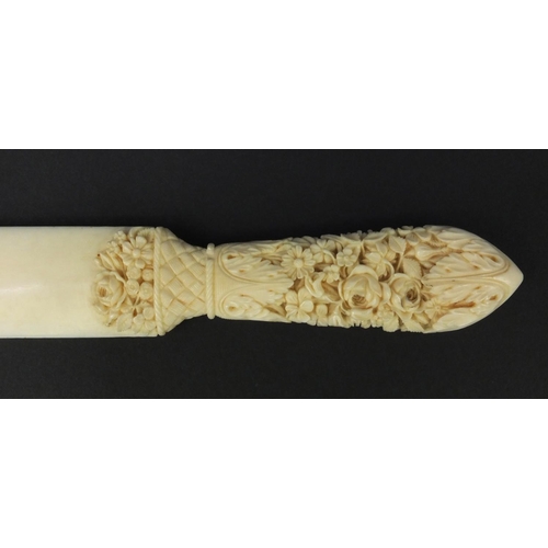 139 - Floral carved ivory letter opener, 24cm wide