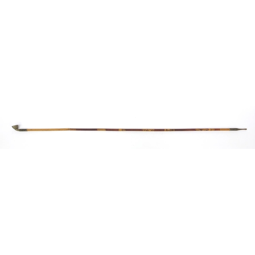 658 - Oriental Chinese bamboo opium pipe, the stem with leaf decoration, 100cm long