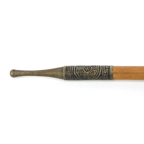 658 - Oriental Chinese bamboo opium pipe, the stem with leaf decoration, 100cm long