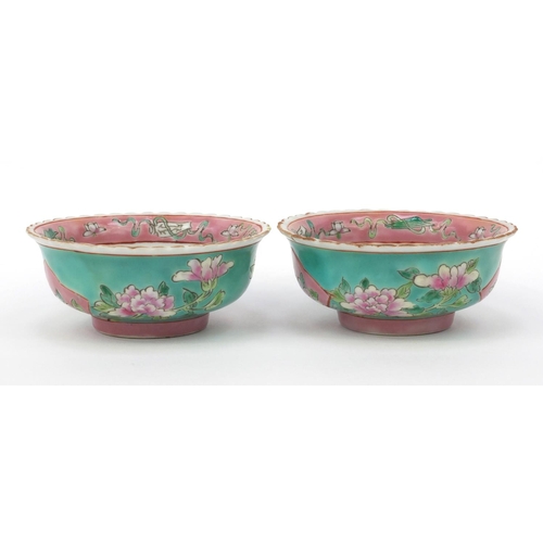 580 - Two oriental Chinese porcelain bowls hand painted with flowers, character mark to base, each 11cm di... 
