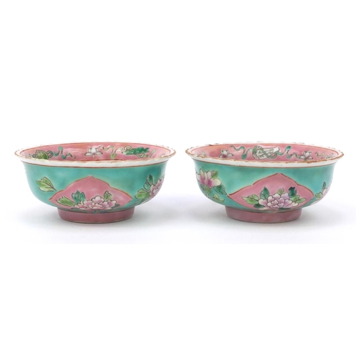 580 - Two oriental Chinese porcelain bowls hand painted with flowers, character mark to base, each 11cm di... 