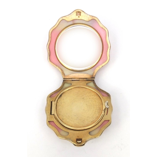 111 - Russian silver gilt shell shaped compact with mirrored interior, 8cm x 7cm