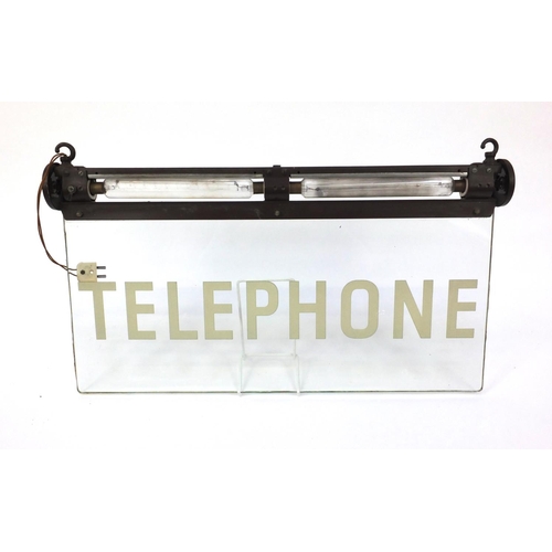 178 - Advertising interest hanging illuminating glass telephone sign, 54cm wide