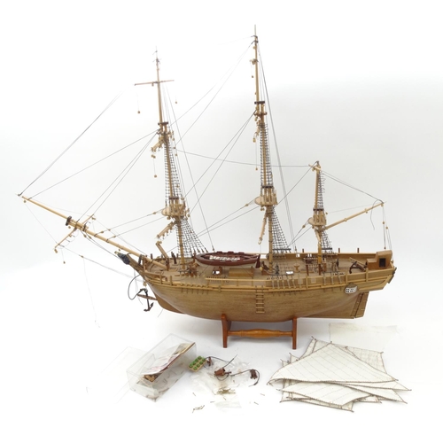 43 - Wooden model rigged sailing boat, 72cm high