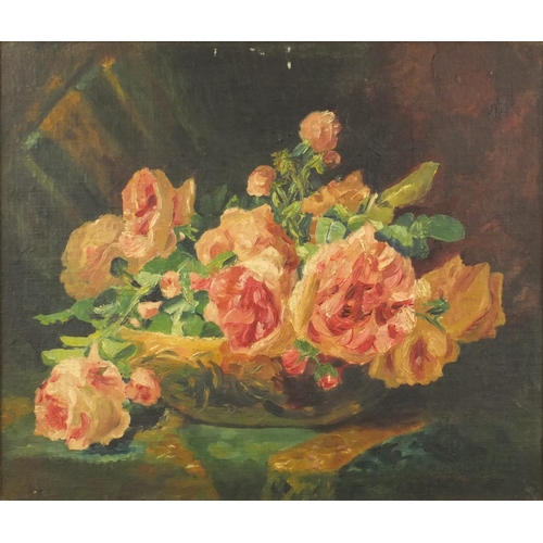 1303 - Unsigned oil onto board view of still life flowers in a vase, label to the reverse 'F.L. Pettman, Lt... 