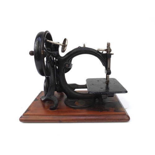 93 - Victorian Wilcox & Gibbs chain stitch sewing machine numbered A35441, together with a fitted case, t... 