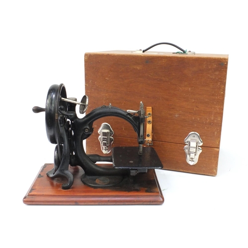 93 - Victorian Wilcox & Gibbs chain stitch sewing machine numbered A35441, together with a fitted case, t... 