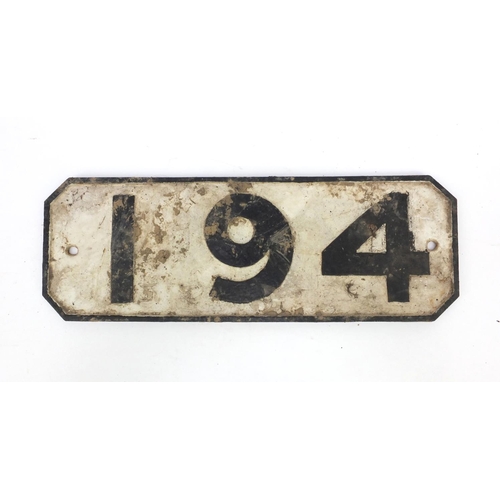 193 - Railway interest cast iron painted rectangular sign '194', 47cm wide