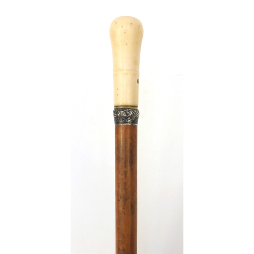 68 - 18th Century Malacca walking cane with ivory pommel and silver collar, 94cm long