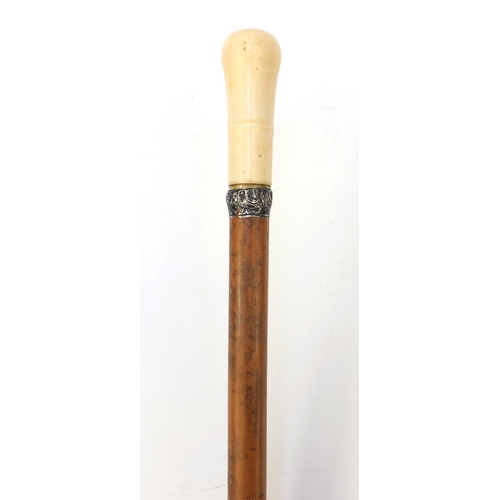 68 - 18th Century Malacca walking cane with ivory pommel and silver collar, 94cm long