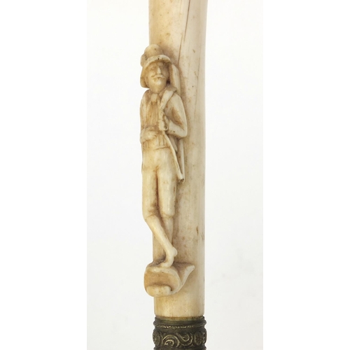 64 - Malacca walking cane with ivory handle carved as a huntsman, 82cm long