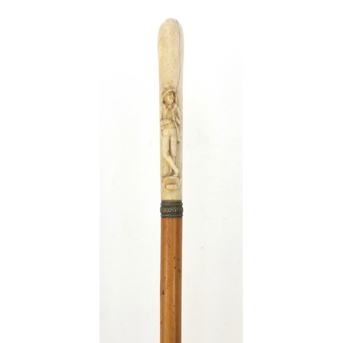 64 - Malacca walking cane with ivory handle carved as a huntsman, 82cm long