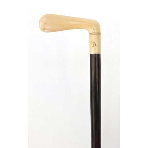 67 - Golfing interest rosewood walking stick with ivory handle modelled as a putter, 89cm long