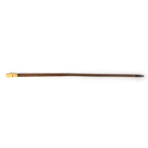 70 - Malacca walking stick with ivory pommel inset with a compass and silver collar, 96cm long