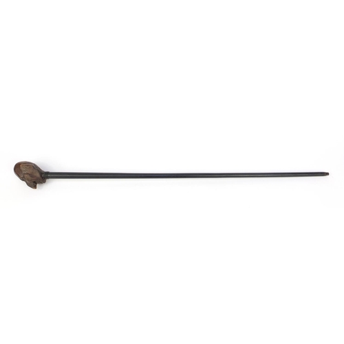 74 - Ebony walking stick with carved wooden handle modelled as a gentleman's head with a black eye, 94cm ... 