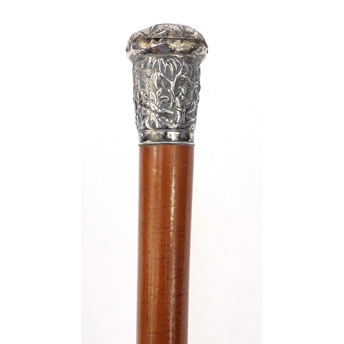 85 - Victorian Malacca cane walking stick with oriental Chinese silver top decorated with figures amongst... 