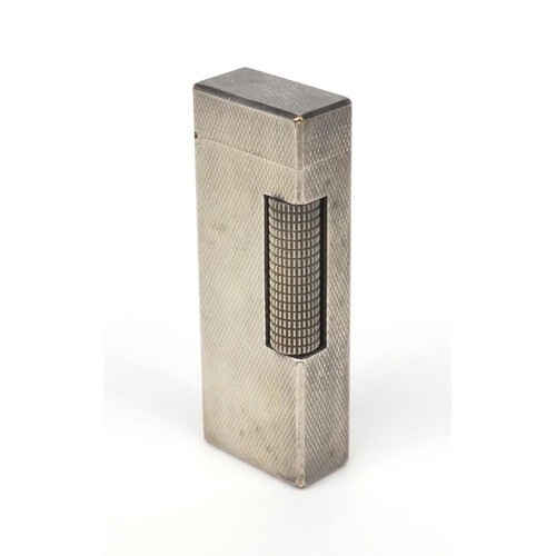 123 - Boxed silver coloured metal Dunhill lighter with engine turned decoration, 6.5cm high