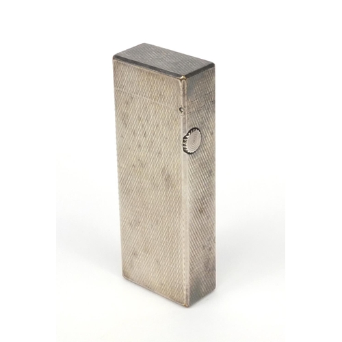 123 - Boxed silver coloured metal Dunhill lighter with engine turned decoration, 6.5cm high