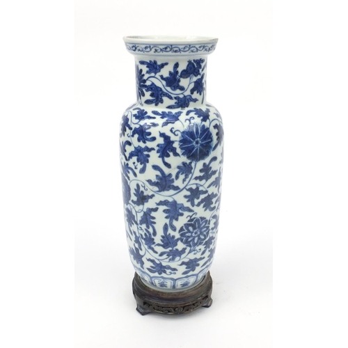 542 - Oriental Chinese porcelain vase hand painted with a continuous band of flowers, raised on a wooden b... 