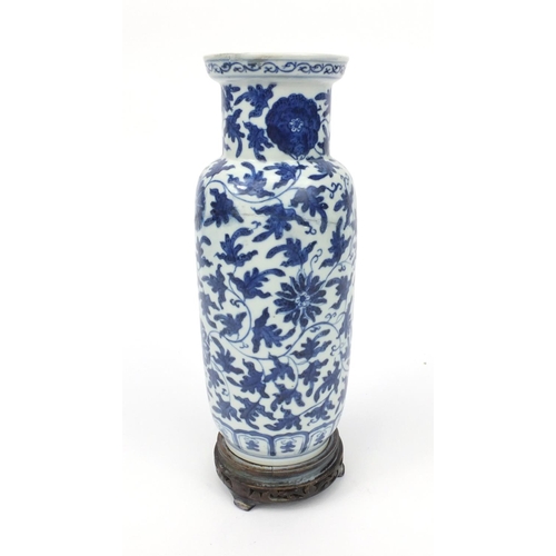 542 - Oriental Chinese porcelain vase hand painted with a continuous band of flowers, raised on a wooden b... 