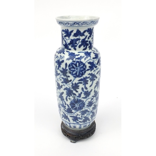 542 - Oriental Chinese porcelain vase hand painted with a continuous band of flowers, raised on a wooden b... 