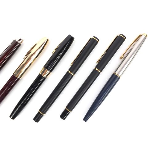 135 - Group of fountain and ballpoint pens including some boxed examples - two Sheaffer fountain pens with... 