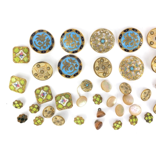 97 - Group of gilt and enamel brass buttons including some with floral decoration and some other mother o... 