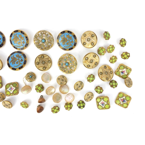 97 - Group of gilt and enamel brass buttons including some with floral decoration and some other mother o... 