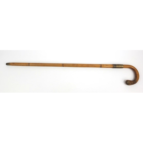 86 - Bamboo walking cane, unscrewing to reveal an geologist's soil sampling stick, the stick 95cm high