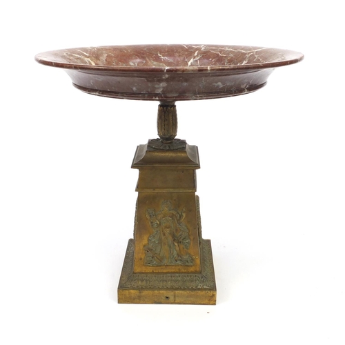 4 - Large red variegated marble topped tazza mounted on a tapered brass column decorated in relief with ... 